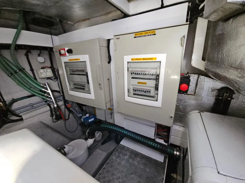 Slide: The Image of Electrical control panels in the engine room of a 2010 Sunseeker Predator 64 yacht. - 28