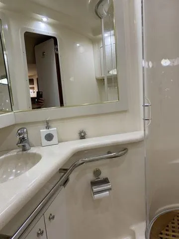 Slide: The Image of Luxurious bathroom interior of 2003 Sea Ray 550 Sundancer yacht with modern fixtures. - 14
