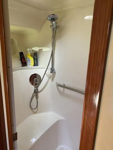 Slide: The Image of Shower area in 2003 Sea Ray 550 Sundancer yacht with toiletries. - 16