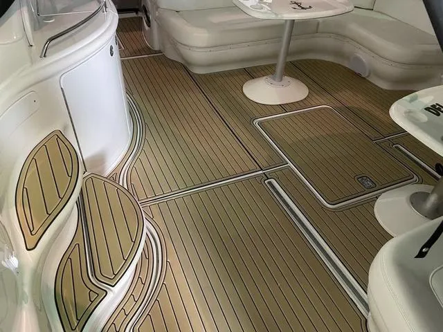 Slide: The Image of Luxurious 2003 Sea Ray 550 Sundancer yacht interior with elegant seating and teak flooring. - 6
