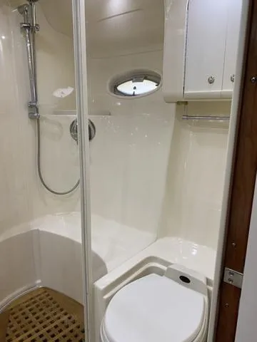 Slide: The Image of Luxurious bathroom in 2003 Sea Ray 550 Sundancer yacht with shower and toilet. - 8