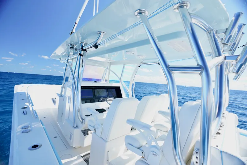 Slide: The Image of 2020 SeaHunter 46 CTS boat interior with sleek design and ocean backdrop. - 24