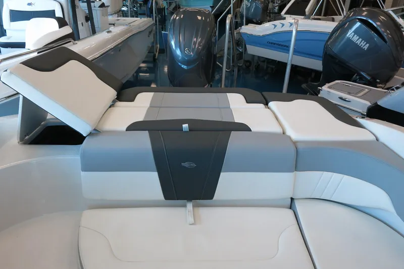 Slide: The Image of 2024 Chaparral 23 SSi OB boat interior with sleek seating and modern design. - 32