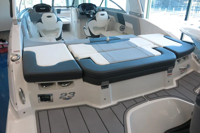 Slide: The Image of 2024 Chaparral 23 SSi OB boat interior with sleek seating and modern design. - 4