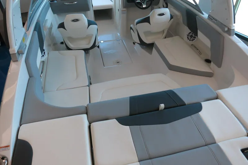 Slide: The Image of 2024 Chaparral 23 SSi OB boat interior with spacious seating and modern design. - 6