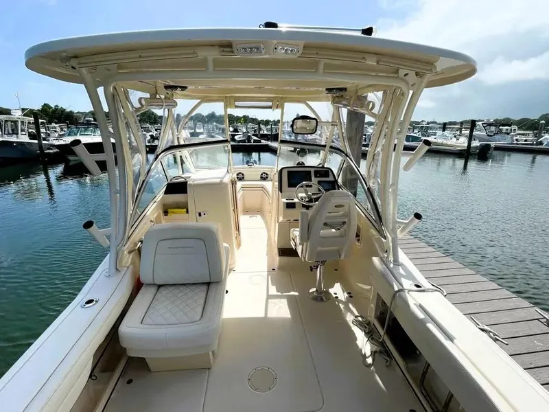 Slide: The Image of 2021 Grady-White Freedom 235 boat interior at marina dock. - 9