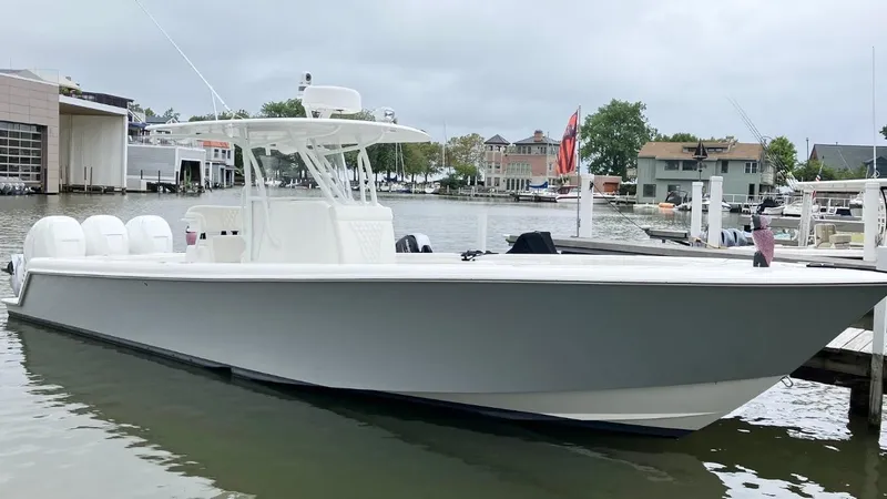 Slide: The Image of 2020 Contender 35 ST boat docked in a marina, overcast sky. - 3