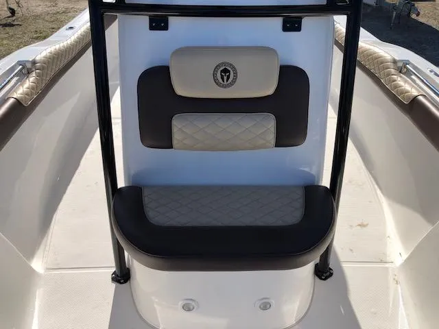 Slide: The Image of 2024 Reflex Gladiator boat interior with cushioned seating and elegant design. - 15