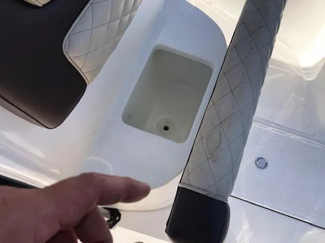 Slide: The Image of 2024 Reflex Gladiator boat seating with storage compartment and quilted upholstery. - 22