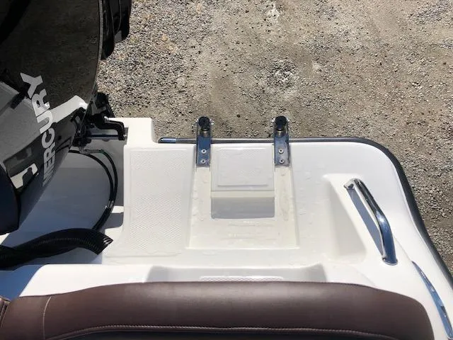 Slide: The Image of 2024 Reflex Gladiator boat with Mercury engine, rear view. - 29