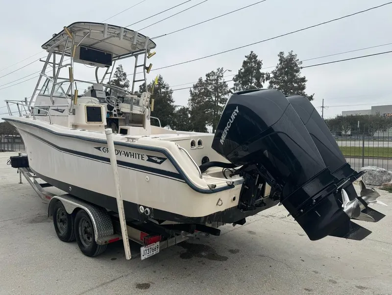 Slide: The Image of 1995 Grady-White 268 Islander WA boat on trailer with Mercury outboard motor. - 7