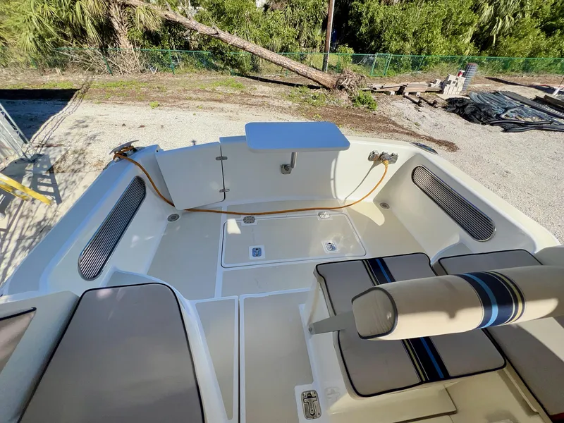 Slide: The Image of Marlow Pilot 31 boat interior, 2016 model, featuring seating and deck area. - 23