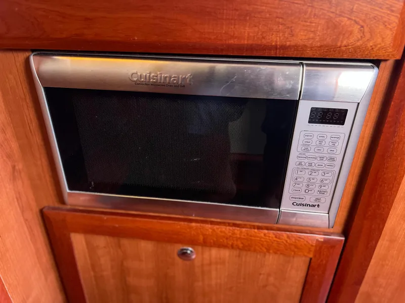 Slide: The Image of Cuisinart microwave in 2016 Marlow Pilot 31 Pilot boat kitchen. - 30