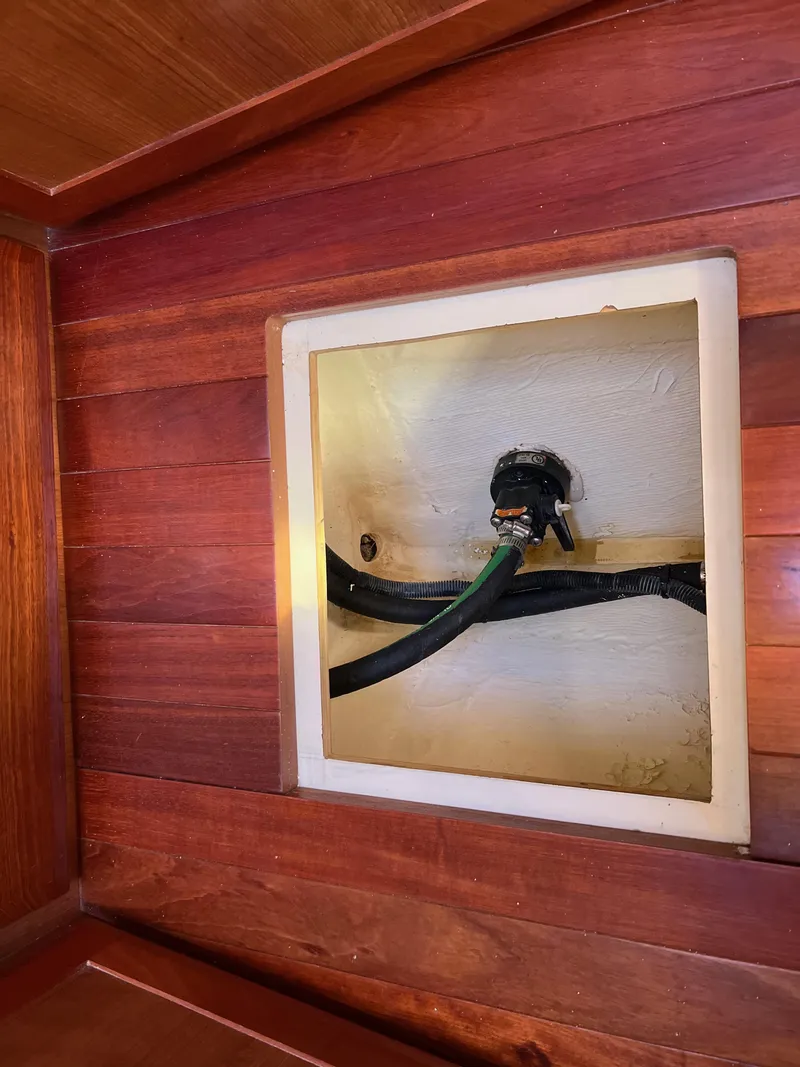 Slide: The Image of Wooden interior panel with access hatch on 2016 Marlow Pilot 31 Pilot boat. - 51