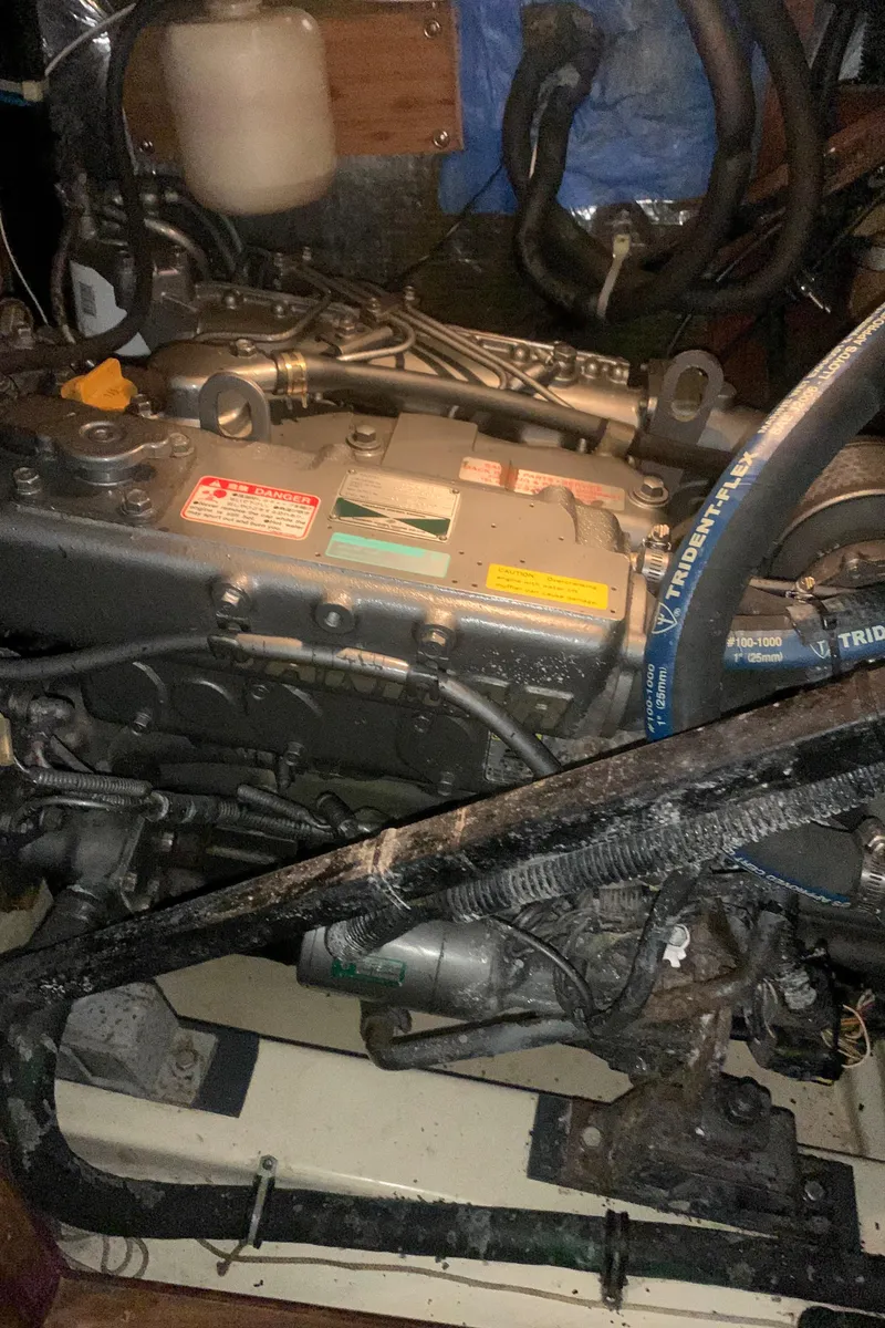 Slide: The Image of Engine compartment of a 1998 Hunter Passage 42 sailboat. - 14