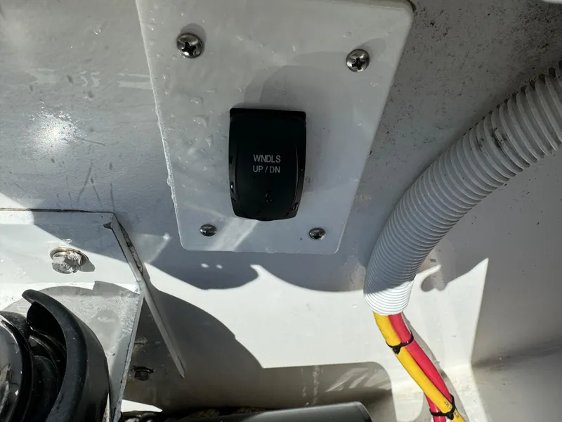 Slide: The Image of Switch panel on 2017 Buddy Davis 34 cc boat with wiring and tubing. - 10