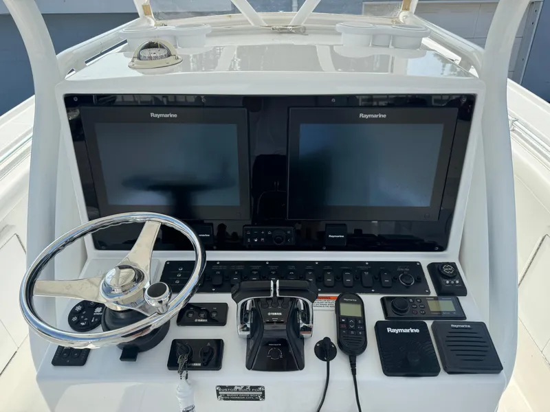 Slide: The Image of 2017 Buddy Davis 34 cc helm with Raymarine displays and controls. - 23