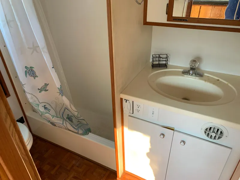 Slide: The Image of Bathroom interior of 1996 Harbor Master 460 WIDEBODY with sink and shower. - 11