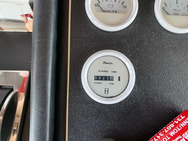 Slide: The Image of Close-up of 1996 Harbor Master 460 WIDEBODY boat's hour meter and volt gauges. - 4