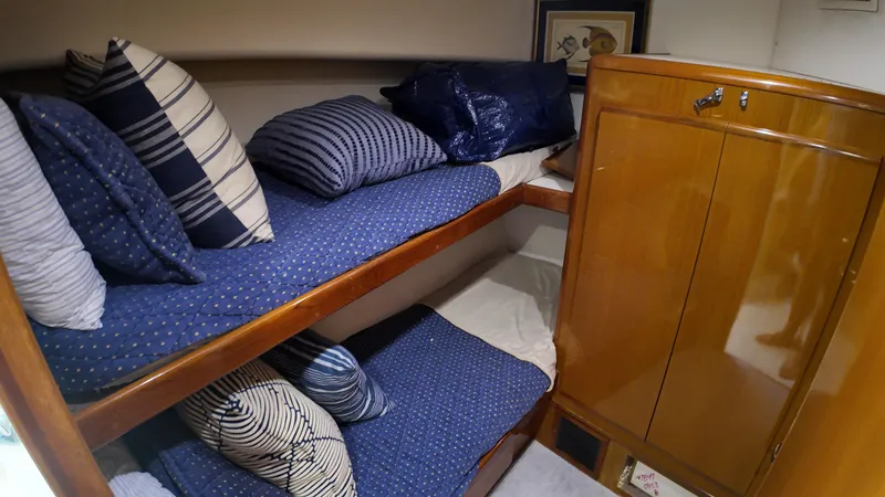 Slide: The Image of Cozy cabin with bunk beds in 1999 Viking 47 Convertible yacht. - 19