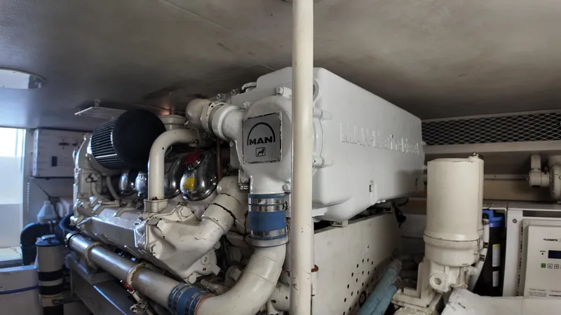 Slide: The Image of Engine room of 1999 Viking 47 Convertible yacht with MAN engine. - 39