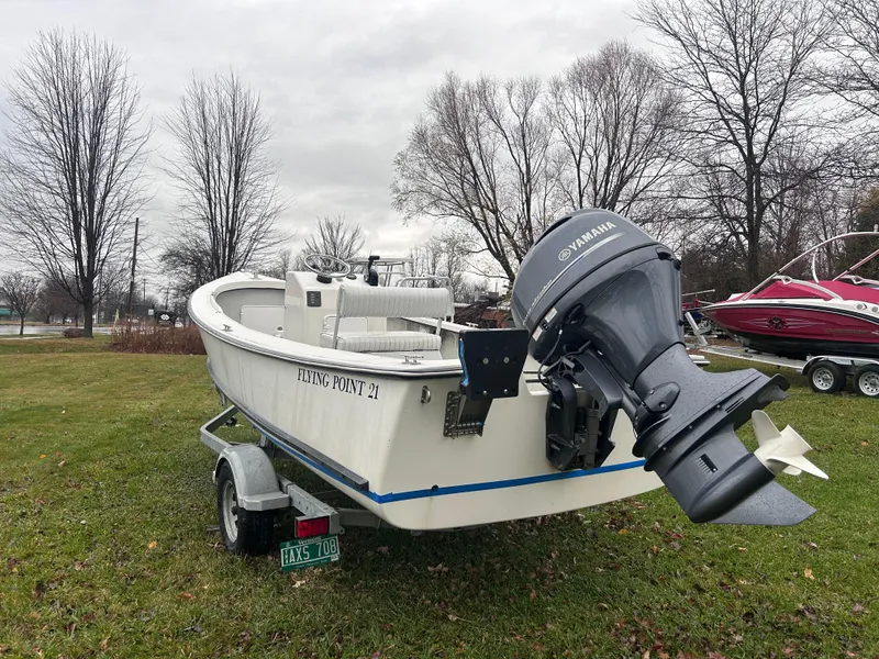 Slide: The Image of 2020 Flying Point Boatworks FP 21 on trailer with Yamaha outboard motor. - 4
