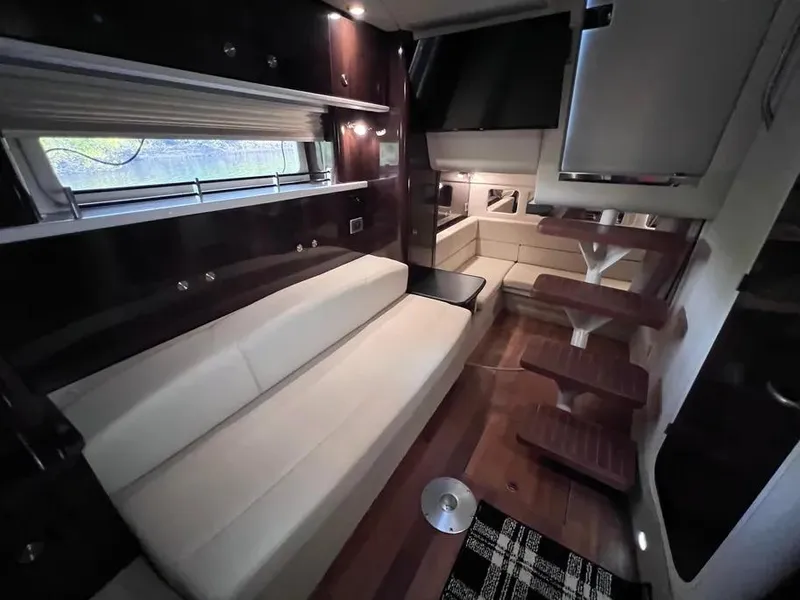 Slide: The Image of Luxurious interior of 2015 Sea Ray 330 Sundancer yacht with elegant seating and modern design. - 20