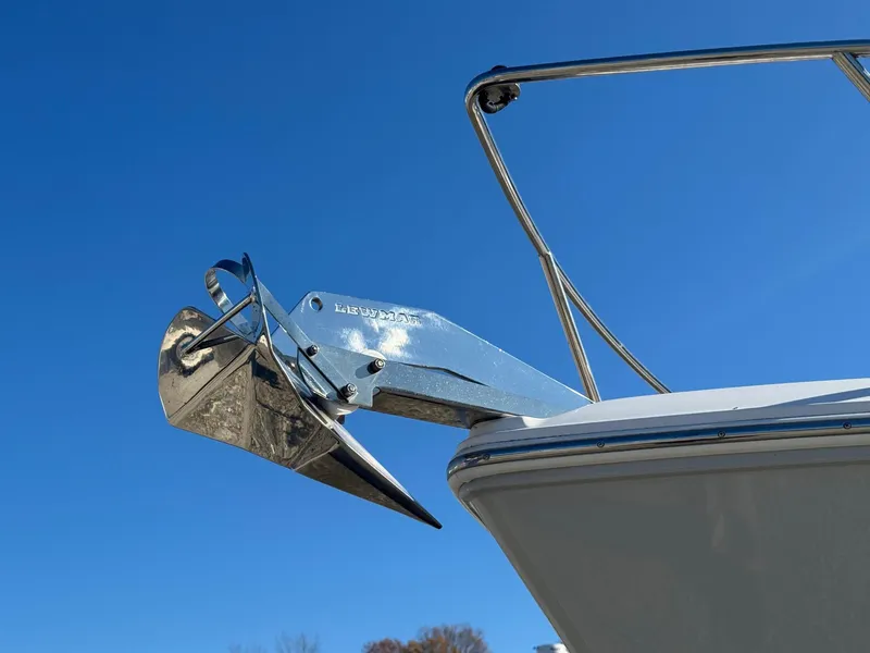 Slide: The Image of 2019 Regal 26 XO boat anchor against clear blue sky. - 14