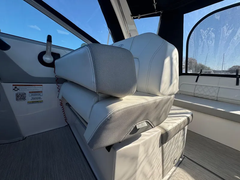 Slide: The Image of 2019 Regal 26 XO boat interior with plush seating and modern design. - 20