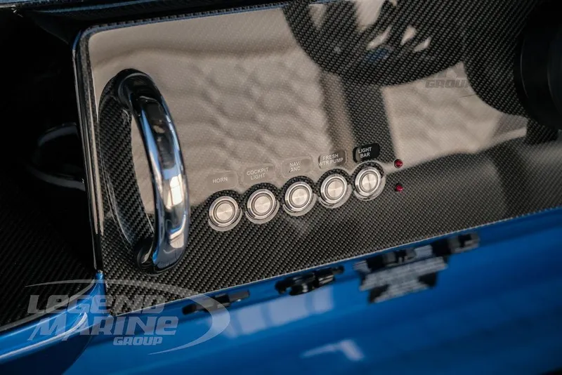 Slide: The Image of Control panel of 2025 Nor-Tech 340 Sport boat with carbon fiber finish. - 15