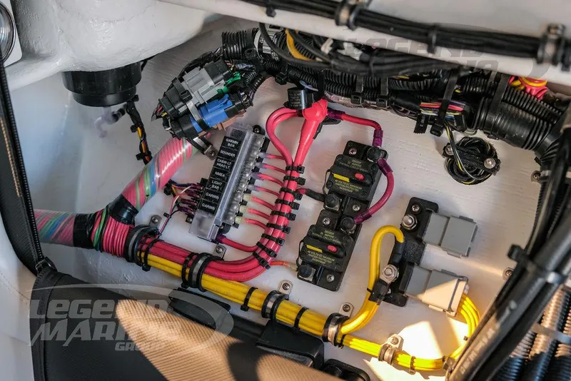 Slide: The Image of 2025 Nor-Tech 340 Sport boat wiring and electrical components. - 21