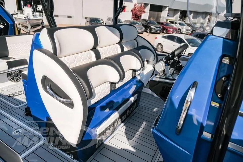 Slide: The Image of 2025 Nor-Tech 340 Sport boat interior with luxurious seating and modern design. - 25