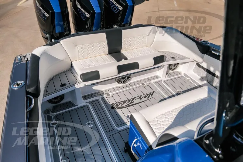 Slide: The Image of 2025 Nor-Tech 340 Sport boat interior with luxurious seating and modern design. - 28