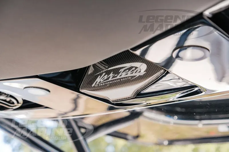 Slide: The Image of 2025 Nor-Tech 340 Sport boat detail with logo and sleek design elements. - 32