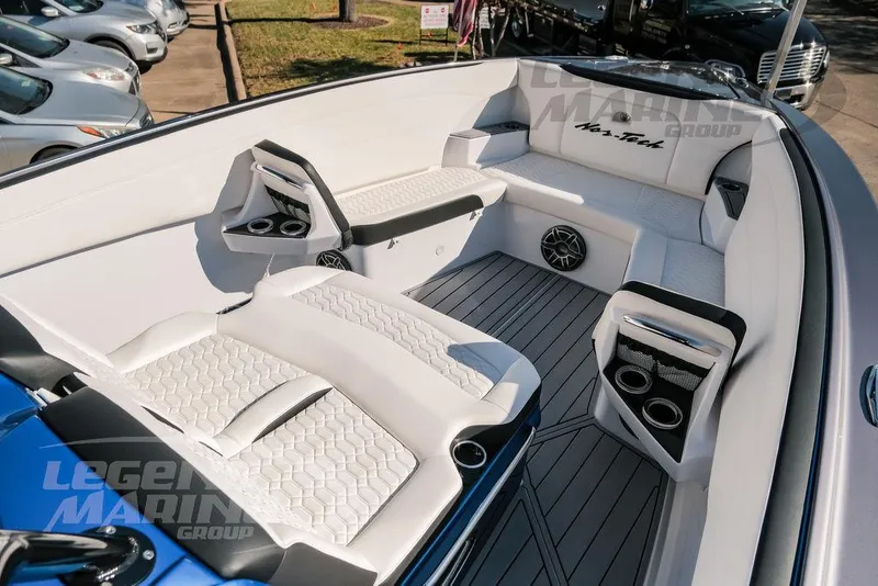 Slide: The Image of 2025 Nor-Tech 340 Sport boat interior with white seating and modern design. - 35