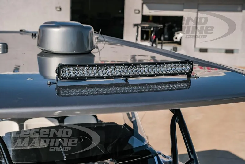 Slide: The Image of 2025 Nor-Tech 340 Sport boat with LED light bar on the roof. - 40