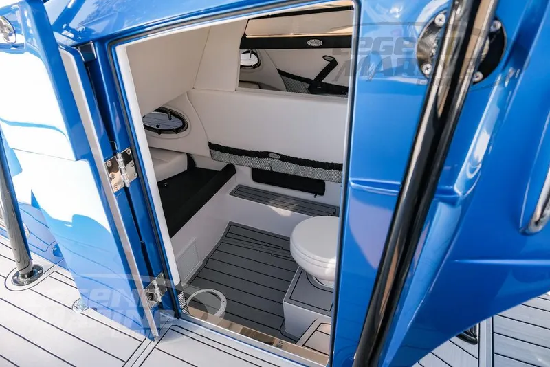Slide: The Image of 2025 Nor-Tech 340 Sport boat interior with compact bathroom. - 41