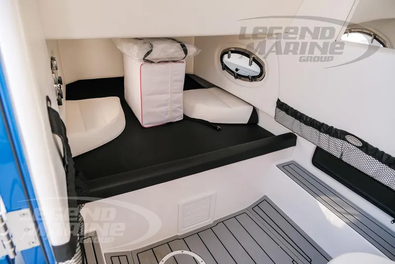 Slide: The Image of Interior cabin of 2025 Nor-Tech 340 Sport boat, featuring modern design and comfortable seating. - 42