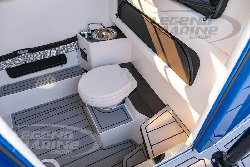 Slide: The Image of 2025 Nor-Tech 340 Sport boat interior with modern bathroom amenities. - 44