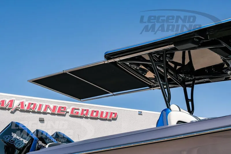 Slide: The Image of 2025 Nor-Tech 340 Sport boat with canopy at Legend Marine Group. - 47