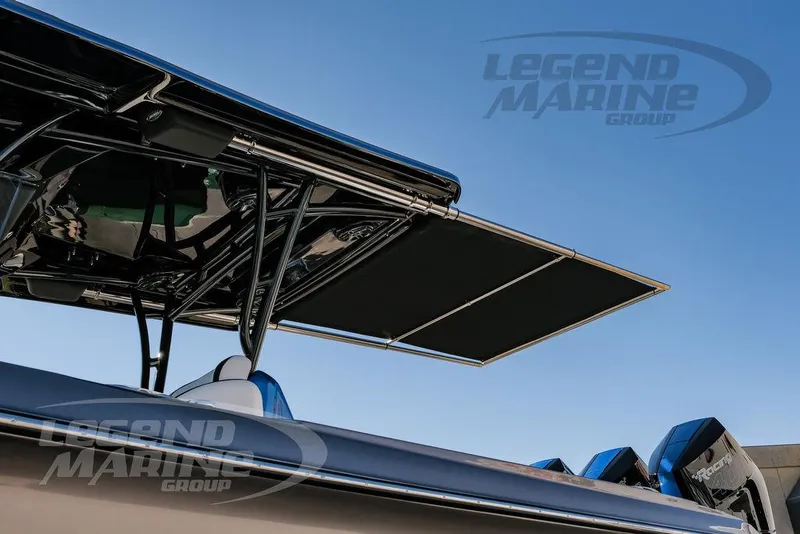 Slide: The Image of 2025 Nor-Tech 340 Sport boat with sleek design and powerful engines. - 48