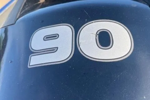Slide: The Image of Close-up of "90" on 2014 Lowe Fishing Machine FM165WT boat. - 2
