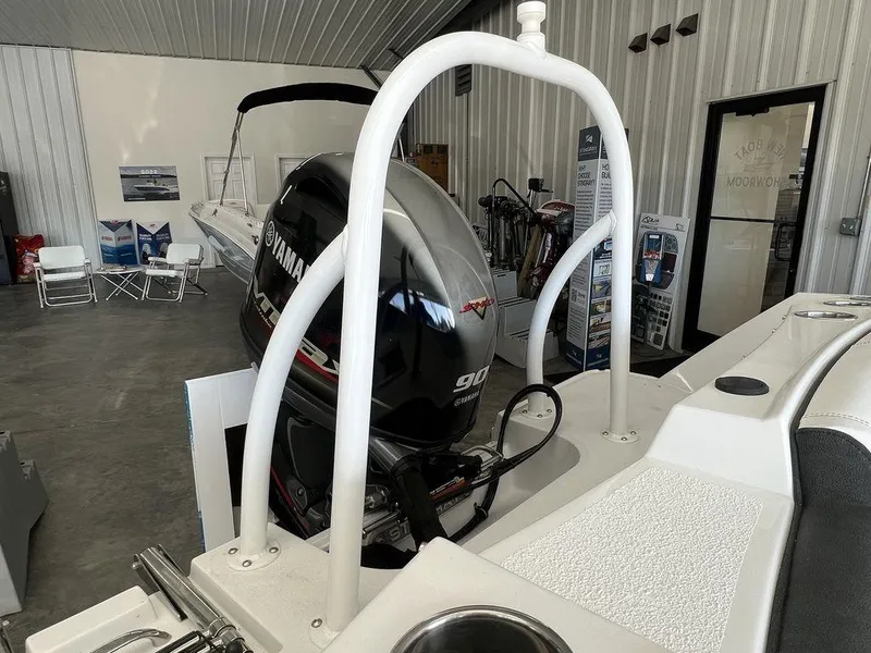 Slide: The Image of 2025 Stingray 172SC boat with Yamaha 90 engine in showroom. - 8
