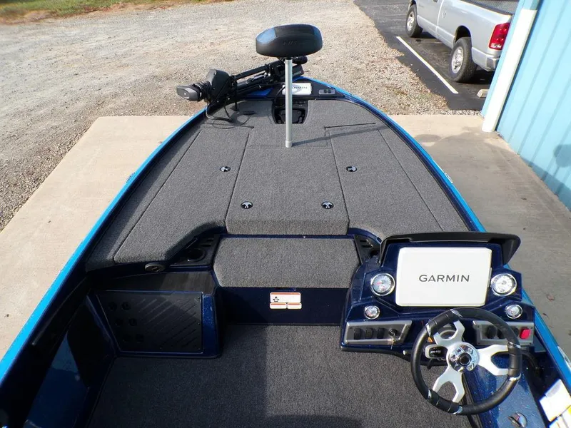 Slide: The Image of 2025 Nitro Z18 Pro boat interior with Garmin navigation system and steering wheel. - 11