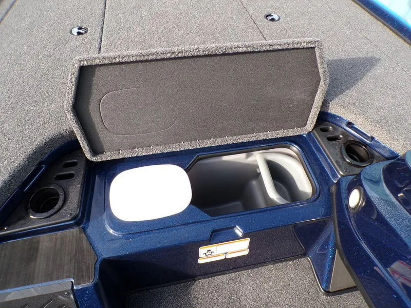 Slide: The Image of 2025 Nitro Z18 Pro boat storage compartment with open lid. - 16