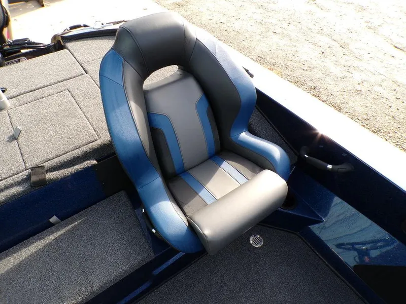 Slide: The Image of 2025 Nitro Z18 Pro boat seat, blue and gray design, on deck. - 17