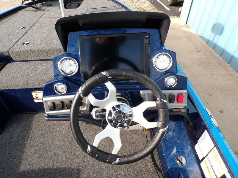 Slide: The Image of Steering console of 2025 Nitro Z18 Pro boat with modern dashboard and controls. - 20