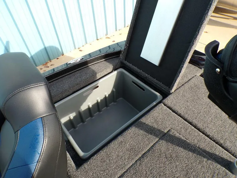 Slide: The Image of Open storage compartment in 2025 Nitro Z18 Pro boat. - 24