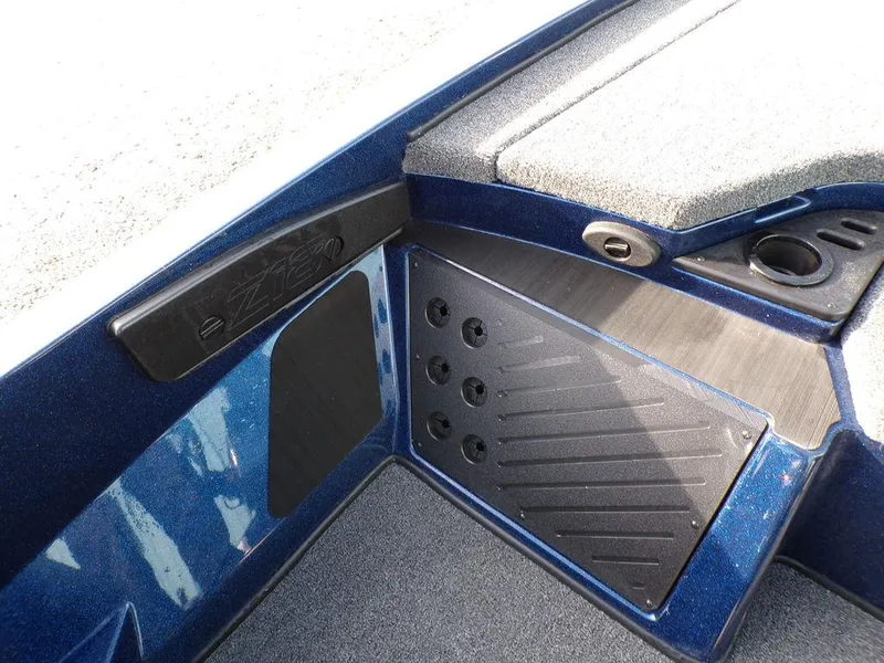 Slide: The Image of 2025 Nitro Z18 Pro boat interior with storage compartments and cup holder. - 26