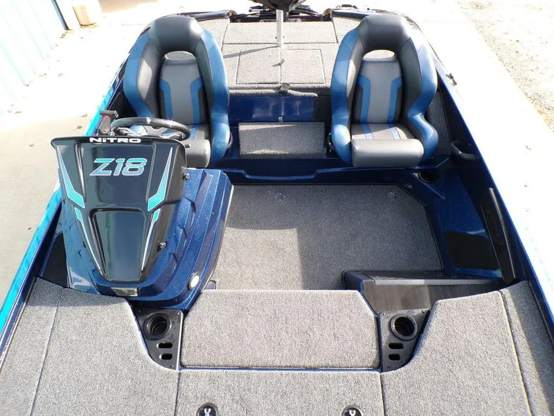 Slide: The Image of 2025 Nitro Z18 Pro boat interior with dual seats and sleek design. - 28